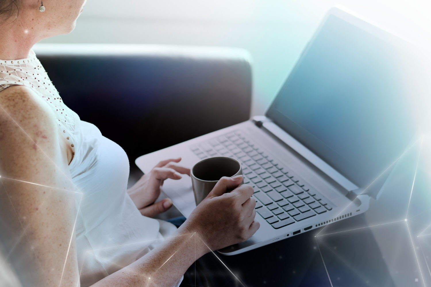 Woman analysing website traffic sources on laptop with network overlay